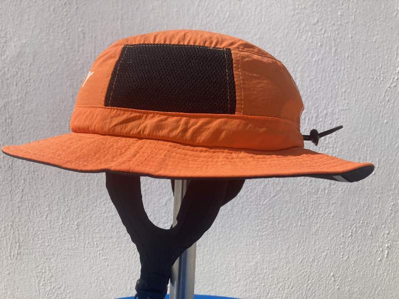 uv_protective_kitesurf_hat_safety_bump_cap_orange_side uv_protective_kitesurf_hat_safety_bump_cap_orange_side