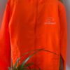 Orange Kitemonkey windproof jacket for kitesurfing, wingfoiling and watersports